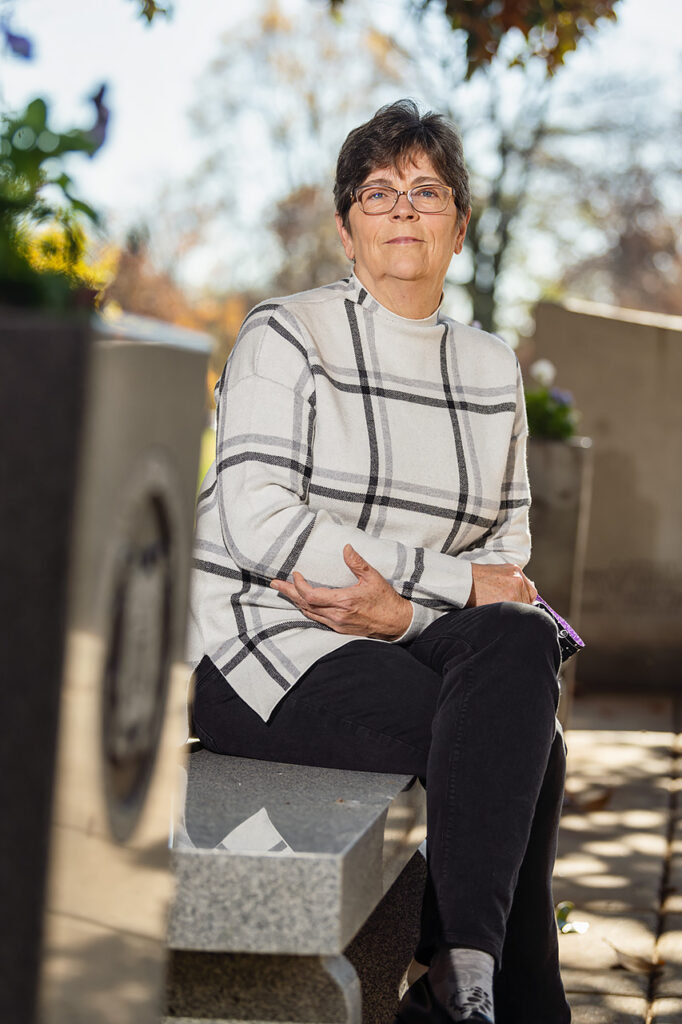 Rebecca Calahan, Mathematical Sciences faculty at the Veterans Memorial. (Photo: Andy Heidt)