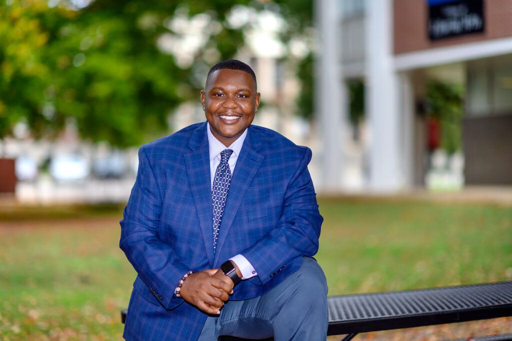 Travis Strattion, Student Success Assistant Manager of Scholars Academy staff portrait. (Photo: J. Intintoli)