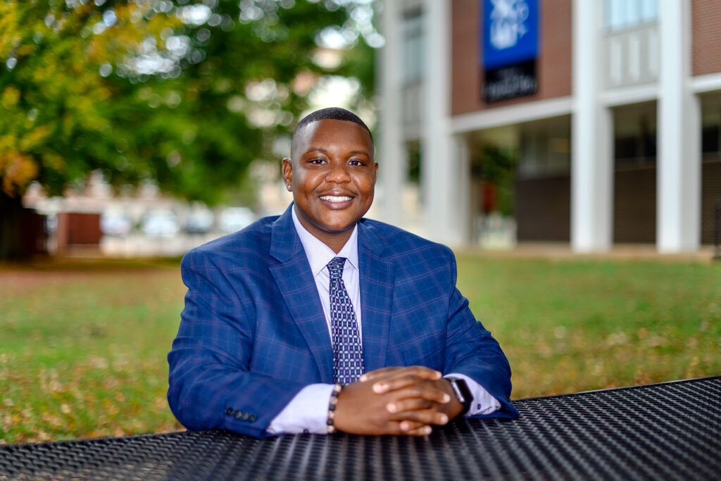 Travis Strattion, Student Success Assistant Manager of Scholars Academy staff portrait. (Photo: J. Intintoli)