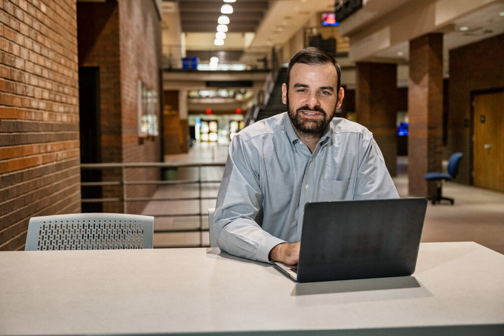 Matthew Taylor, Journalism and Strategic Media faculty, in and around the Bragg Media and Entertainment Building. (Photo: Andy Heidt)