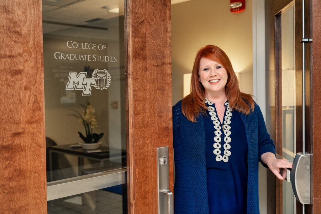 Sherry Fuller, Coordinator, Graduate Studies, in and around the Ingram Building for her Service to Students profile.