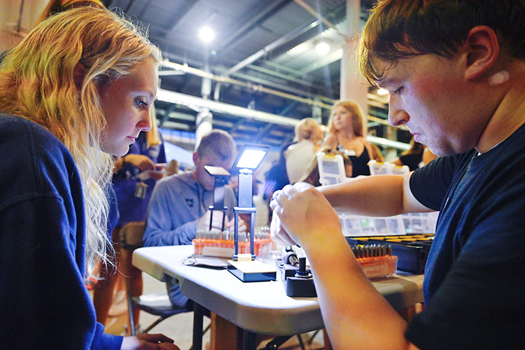 New MTSU freshmen and transfer students enjoy the President’s Welcome Bash on Saturday, Aug. 21, in the concourse of Floyd Stadium. The event was moved from the football field area because of rain. (MTSU photo by Cat Curtis Murphy)