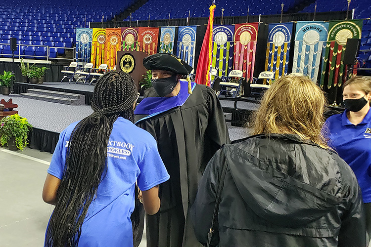 New York Times bestselling author Wes Moore, centert, shakes hands with MTSU students following his keynote remarks Saturday, Aug. 21, at the University Convocation at Murphy Center to formally welcome new freshmen and transfer students to the Blue Raider community. (MTSU photo by Jimmy Hart)
