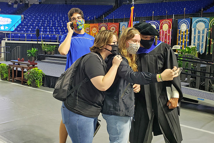 New York Times bestselling author Wes Moore, right, takes a selfie with MTSU students following his keynote remarks Saturday, Aug. 21, for the University Convocation at Murphy Center to formally welcome new freshmen and transfer students to the Blue Raider community. (MTSU photo by Jimmy Hart)