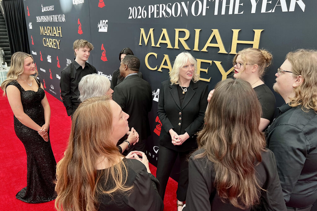 MTSU President Sidney A. McPhee and Beverly Keel, dean of the Scott Borchetta College of Media and Entertainment, chat with students and faculty and staff on the red carpet Friday, Jan. 30, 2026, in Los Angeles at the MusiCares 2026 Person of the Year gala honoring Mariah Carey, part of the university’s 12th annual trip for the Grammy Awards. The delegation is taking part in events before and during the 68th annual Grammy Awards on Sunday. (MTSU file photo by Andrew Oppmann)