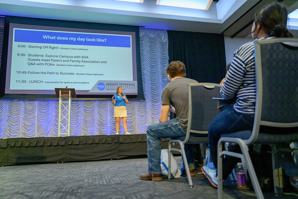 Gina Poff, director of New Student and Family Programs at Middle Tennessee State University in Murfreesboro, Tenn., provides directions to a group of New to Blue Orientation students attending the May 27 session in the Student Union Ballroom on campus. Several hundred students and their parents attended, part of 3,500 expected to come for orientation this summer. (MTSU photo by J. Intintoli)