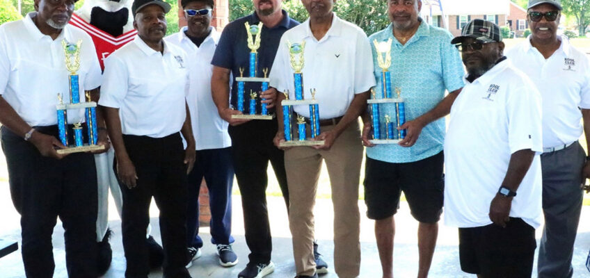Pictured from left, holding their trophies, are Alvin Boyd, Chris Henderson, Ken Moore and Byron Thomas, first-place winners of the KOOL Club’s second Kenneth L. Toney Golf Tournament held in mid-May at Indian Hills Golf Course in Murfreesboro, Tenn. Also pictured, from left, are Ed Cooper, club vice president, club founders Edd Hill and Collier Woods, and KOOL Club President Tony Grimes. The tournament funds an annual scholarship to a qualifying Middle Tennessee State University student. At back left is the mascot for tournament food sponsor Chick-fil-A. (Submitted photo)