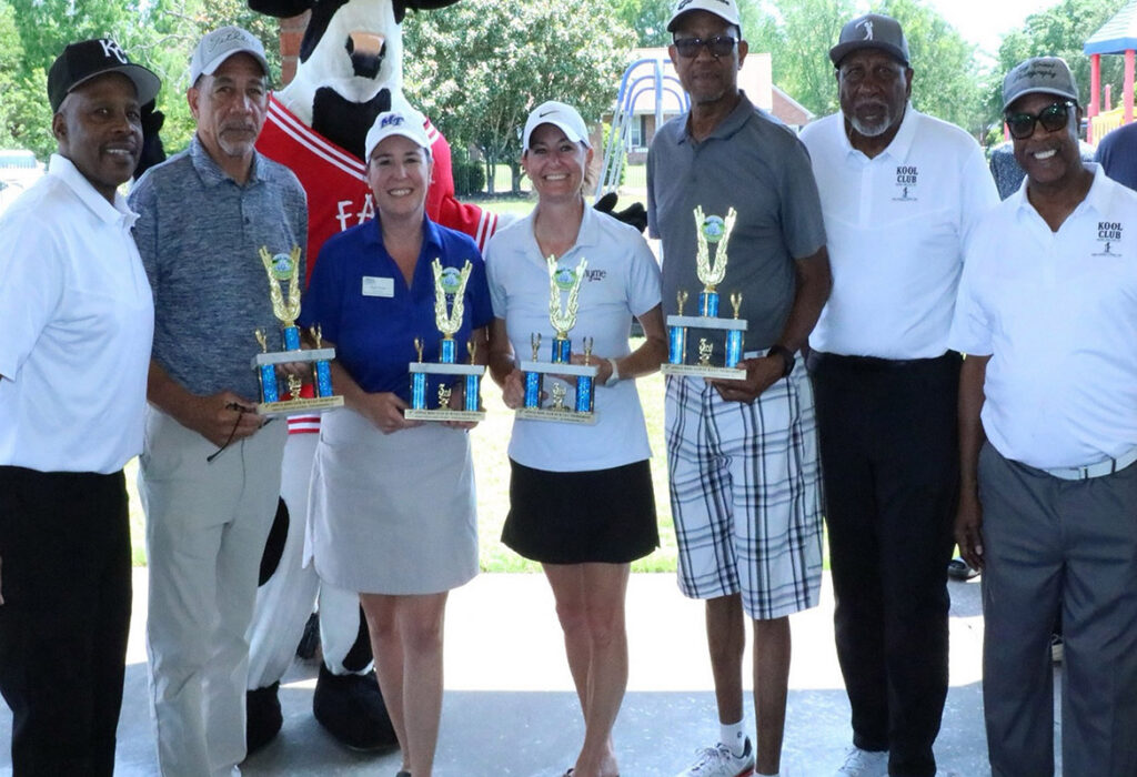 Pictured from left, holding their trophies, are third-place winners Roger Williams, Katie Enzor, Cora Enzor and Paul Gates at the KOOL Club’s second Kenneth L. Toney Golf Tournament held in mid-May at Indian Hills Golf Course in Murfreesboro, Tenn. Also pictured, from left, are club members Ed Cooper, Alvin Boyd and Tony Grimes. At back left is the mascot for tournament food sponsor Chick-fil-A. (Submitted photo)