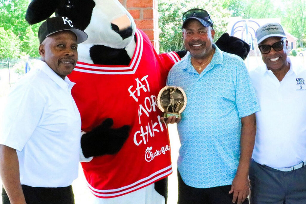 Byron Thomas, second from right, holds the plaque for Closest to the Pin in the men’s division of the KOOL Club’s second Kenneth L. Toney Golf Tournament held in mid-May at Indian Hills Golf Course in Murfreesboro, Tenn. Also pictured are KOOL Club members Ed Cooper, far left, and Tony Grimes, far right, along with the mascot for tournament food sponsor Chick-fil-A, second from left. (Submitted photo)