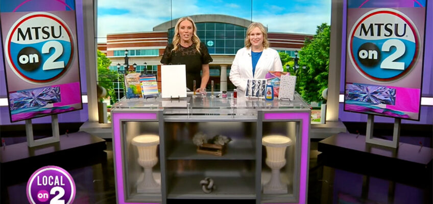 Sarah Pierce, right, a chemistry instructor at Middle Tennessee State University, appears on a recent “MTSU on 2” segment from WKRN-TV’s Nashville, Tenn., studios to talk about the unique history of Prussian blue and its many uses. At left is program host Stephanie Langston. (Screen capture from Local on 2 YouTube channel)