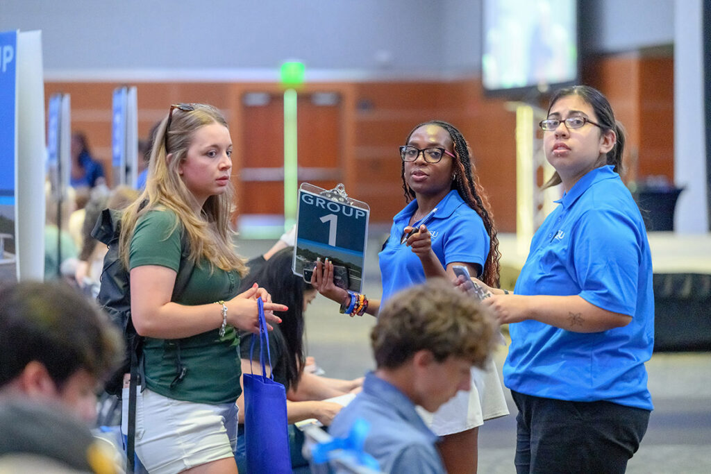 Middle Tennessee State University New to Blue Orientation guides assist an incoming Blue Raider during the May 27 session, which kicked off in the Student Union Ballroom on campus in Murfreesboro, Tenn. In a nutshell, New to Blue Orientation shows new students the ropes of being an MTSU student and offers vital information. This orientation must be completed before an incoming student can be advised and register for courses. (MTSU photo by J. Intintoli)
