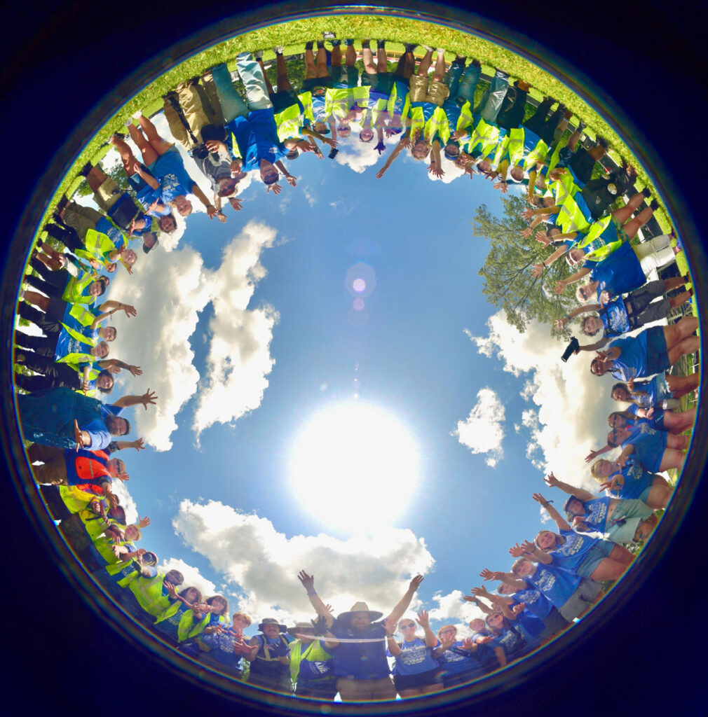Middle Tennessee State University students, faculty, and staff pose for the traditional fisheye group photo at the Bonnaroo Music and Arts Festival held June 11-14, 2026, in Manchester, Tenn. (MTSU photo by Jonathan Trundle)
