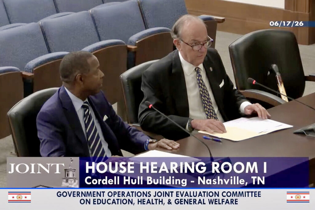 Stephen B. Smith, right, chairman of the Board of Trustees at Middle Tennessee State University in Murfreesboro, Tenn., and MTSU President Sidney A. McPhee, left, appear for a sunset hearing before state lawmakers on Wednesday, June 17, 2026, at the Cordell Hull Building in Nashville, Tenn. The Tennessee Government Operations Joint Evaluation Committee voted unanimously to recommend a four-year extension of the MTSU board for another four years. (Screenshot of televised hearing)