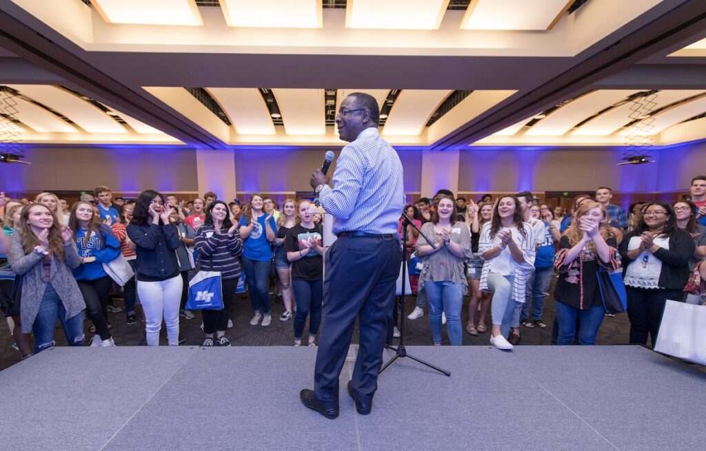 McPhee addressing one of MTSU's True Blue Tour audiences of prospective students and their families