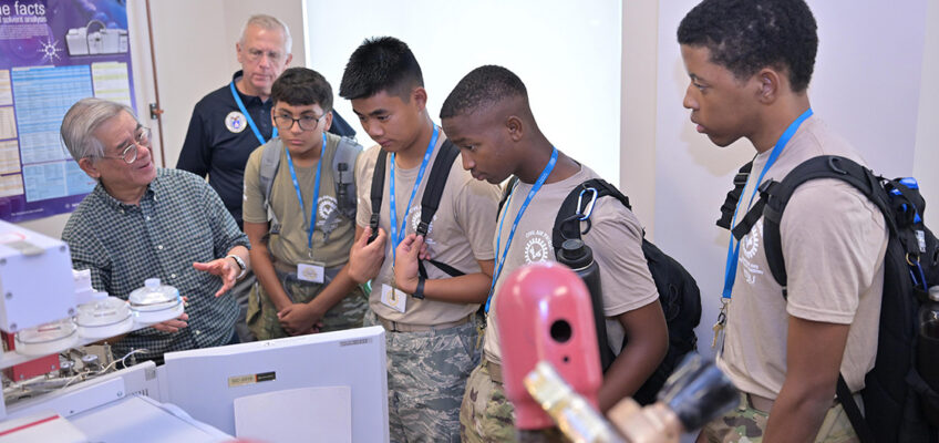 Ngee Sing Chong, left, chemistry professor at Middle Tennessee State University in Murfreesboro, Tenn., conducts a laboratory workshop on agricultural, bioanalytical, environmental, materials, and forensic analysis inside the Science Building for cadets in the U.S. Air Force Auxiliary’s National Cadet Engineering Technology Academy held July 18-25, 2026, on campus. (MTSU Photo by James Cessna)