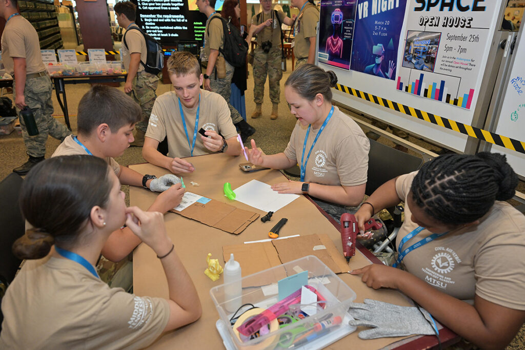 Civil Air Patrol cadets in the U.S. Air Force Auxiliary’s National Cadet Engineering Technology Academy held July 18-25, 2026, at Middle Tennessee State University in Murfreesboro, Tenn., construct projects in the MakerSpace in the James E. Walker Library. (MTSU Photo by James Cessna)