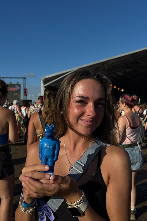 Makaylee Hall holds a miniature Lightning at the Bonnaroo Arts and Music Festival held in Manchester, Tenn., June 11-14, 2026. (Submitted photo)