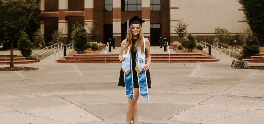 Ella Cobb stands on the seal on the campus of Middle Tennessee State University in Murfreesboro, Tenn. (Photo submitted)