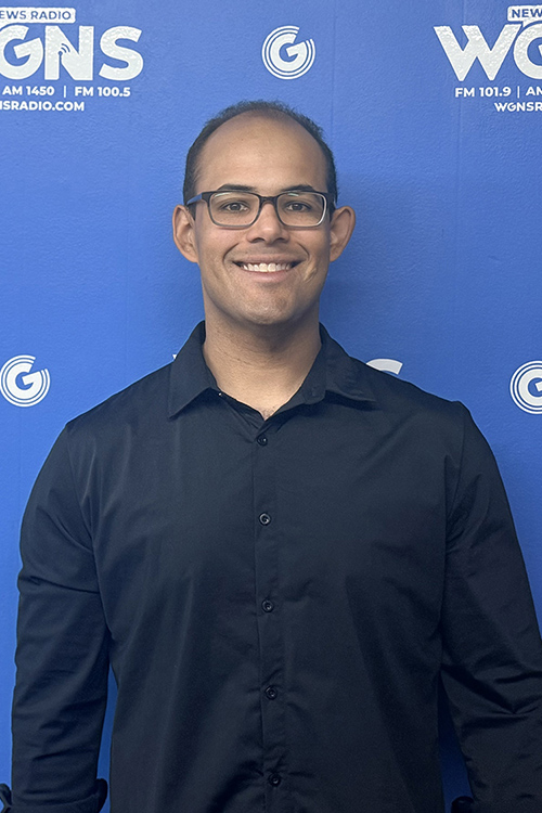 Manuel Giannoni-Guzman, assistant professor of biology, appears June 15, 2026, as a guest on WGNS Radio’s Action Line program from the station’s studio in downtown Murfreesboro, Tenn. He discussed a grant he’s been awarded to study the circadian clock in bees. (MTSU photo by DeAnn Hays)