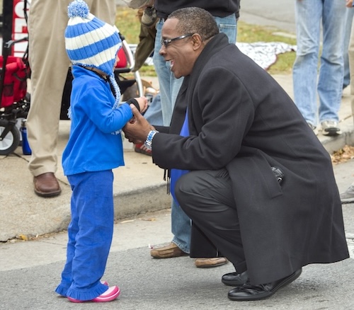 McPhee greeting a young Blue Raider fan