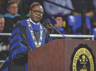 Photo of McPhee at a previous commencement ceremony to link to timeline about significant accomplishments during McPhee era at MTSU