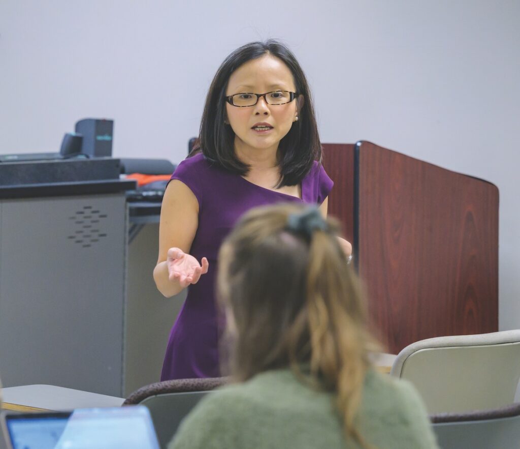 MTSU's Karen Tan teaching her Tourism and Hospitality Management class in Murphy Center (MTSU photo by Andy Heidt)