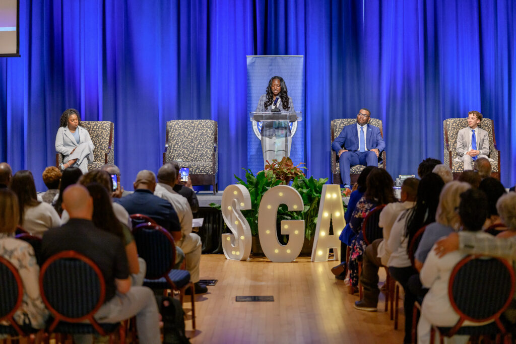Kennedy Garrett, of Chattanooga, Tenn., was elected the 95th Student Government Association president of Middle Tennessee State University in Murfreesboro, Tenn., in April for the 2026-27 academic year. Sitting on stage from left, vice president Nia Moore, outgoing SGA president RJ Ware and election commissioner Luis Esmurria III. (MTSU photo by Andy Heidt)