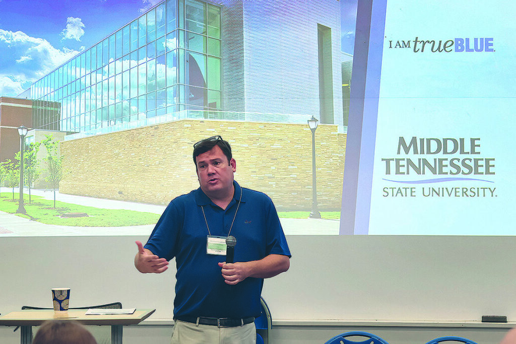 Chris Stephens, professor and chair of the Department of Mathematical Sciences at Middle Tennessee State University in Murfreesboro, Tenn., speaks to a crowd gathered for the inaugural Actuarial Science High School Day held in the spring on campus. (MTSU photo by Carl Edmondson)