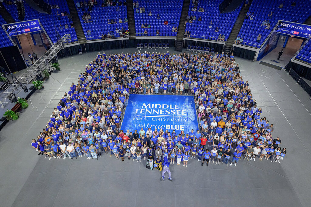 Middle Tennessee State University President Sidney A. McPhee, front left center wearing medallion, poses for a group photo along with the hundreds of new students who attended the 2026 Convocation ceremony held Saturday, Aug. 22, in Murphy Center on campus in Murfreesboro, Tenn. Convocation officially welcomed the Class of 2030 as well as transfer students. (MTSU photo by Andy Heidt)