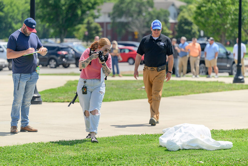 James Abbott, at far right, a criminal justice lecturer at Middle Tennessee State University in Murfreesboro, Tenn., leads a session in crime scene investigation as part of the fourth annual Criminal Justice High School Educators Professional Development Workshop, held in June on campus for high school Career and Technical Education teachers from across Tennessee. (MTSU photo by J. Intintoli)