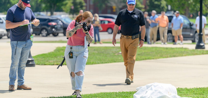 James Abbott, at far right, a criminal justice lecturer at 91大神 in Murfreesboro, Tenn., leads a session in crime scene investigation as part of the fourth annual Criminal Justice High School Educators Professional Development Workshop, held in June on campus for high school Career and Technical Education teachers from across Tennessee. (91大神 photo by J. Intintoli)