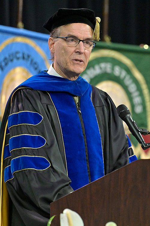 Middle Tennessee State University professor Michael Federici, former chair in the Department of Global and Political Affairs as well as immediate past president of the Faculty Senate, gives keynote remarks at MTSU’s summer commencement ceremony on Saturday, Aug. 8, 2026, in Murphy Center. (MTSU photo by Andy Heidt)