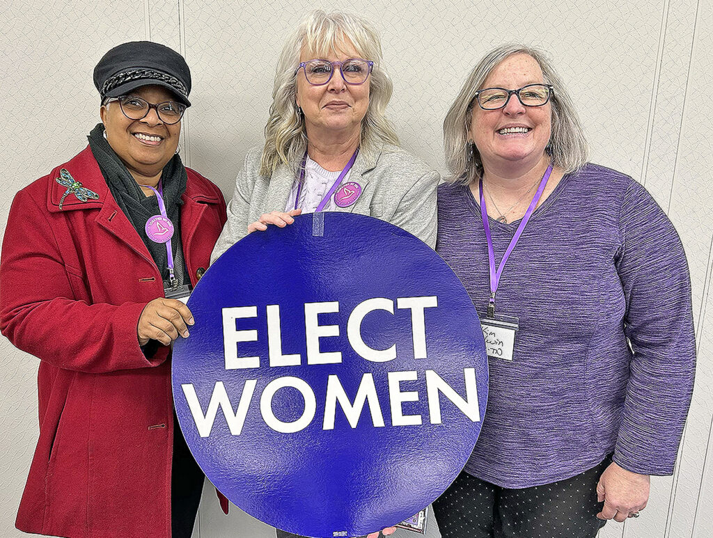 Middle Tennessee State University College of Liberal Arts advisor Lee Anne Carmack, center, stands with League of Women Voters of Murfreesboro/Rutherford County members, Cheryl Griffith, left, and Kim Godwin, assistant professor in the MTSU College of Education, at right, at the 2026 Women’s Day on the Hill at the Tennessee State Capitol in Nashville, Tenn. (Submitted)