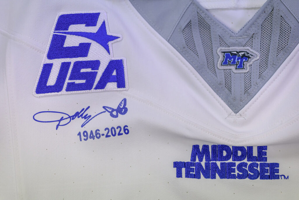 A detail shot of the jersey patch honoring late country music legend Dolly Parton that will be placed on the uniforms of the MTSU Blue Raiders football team for its season opener Sept. 5 at Floyd Stadium in Murfreesboro, Tenn. (MTSU photo by J. Intintoli)