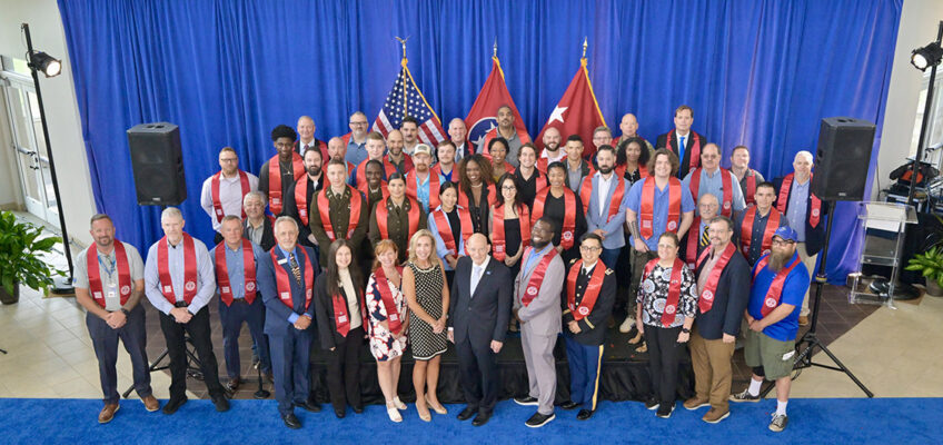 Middle Tennessee State University student veterans pose for a group photo on Thursday, Aug. 6, during the Graduating Veterans Stole Ceremony held in the atrium of the Miller Education Center on campus in Murfreesboro, Tenn. Over 50 student veterans will graduate Saturday, Aug. 8, in MTSU’s Murphy Center. (MTSU photo by Andy Heidt)