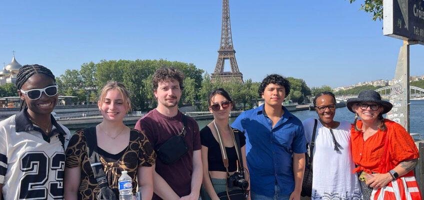 From left, Middle Tennessee State University students Rennee Tetteh, Ella Russell, Justin McNaught, Julia Marcella, Kevin Peralta, Betty Remy and Michelle Halman, pose for a photo in front of the Eiffel Tower in Paris, France, during a study abroad experience. The students were immersed in French language, culture and history through MTSU's faculty-led Summer in Normandy study abroad program, June 22-July 12, 2026. (Submitted photo)