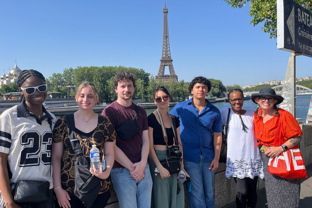 From left, Middle Tennessee State University students Rennee Tetteh, Ella Russell, Justin McNaught, Julia Marcella, Kevin Peralta, Betty Remy and Michelle Halman, pose for a photo in front of the Eiffel Tower in Paris, France, during a study abroad experience. The students were immersed in French language, culture and history through MTSU's faculty-led Summer in Normandy study abroad program, June 22-July 12, 2026. (Submitted photo)