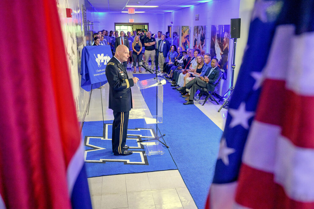 Retired U.S. Army Lt. Gen. Keith M. Huber speaks to the crowd of administrators, alumni, military veterans, staff and students assembled on Wednesday, Sept. 2, 2026, in the lobby of Alumni Memorial Gym at Middle Tennessee State University in Murfreesboro, Tenn., for the unveiling ceremony of the World War II Memorial. Huber serves as senior adviser for veterans and leadership initiatives on campus at the Charlie and Hazel Daniels Veterans and Military Family Center. (MTSU photo by J. Intintoli)