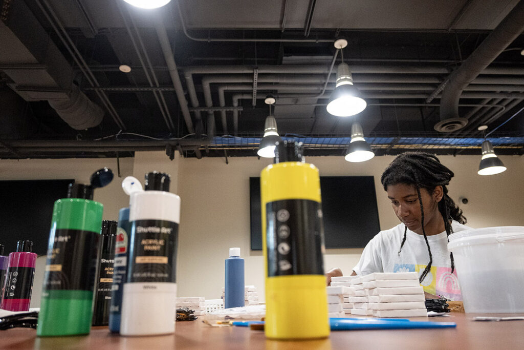 Middle Tennessee State University aerospace major Amariah Woods from Memphis, Tenn., paints a tiny canvas in the new Student Union Craft Center, which opened Sept. 8, 2026, on the second floor of the Student Union Building in Murfreesboro, Tenn. The canvases are part of a community art project to be displayed in the Student Union. (MTSU photo by Cat Curtis Murphy)