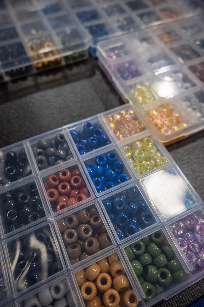Hundreds of pony beads sorted by color await to be threaded onto bracelets, keychains or any number of projects created at the new Student Union Craft Center, which opened Sept. 8, 2026, on the second floor of the Student Union Building at Middle Tennessee State University in Murfreesboro, Tenn. (MTSU photo by Cat Curtis Murphy)