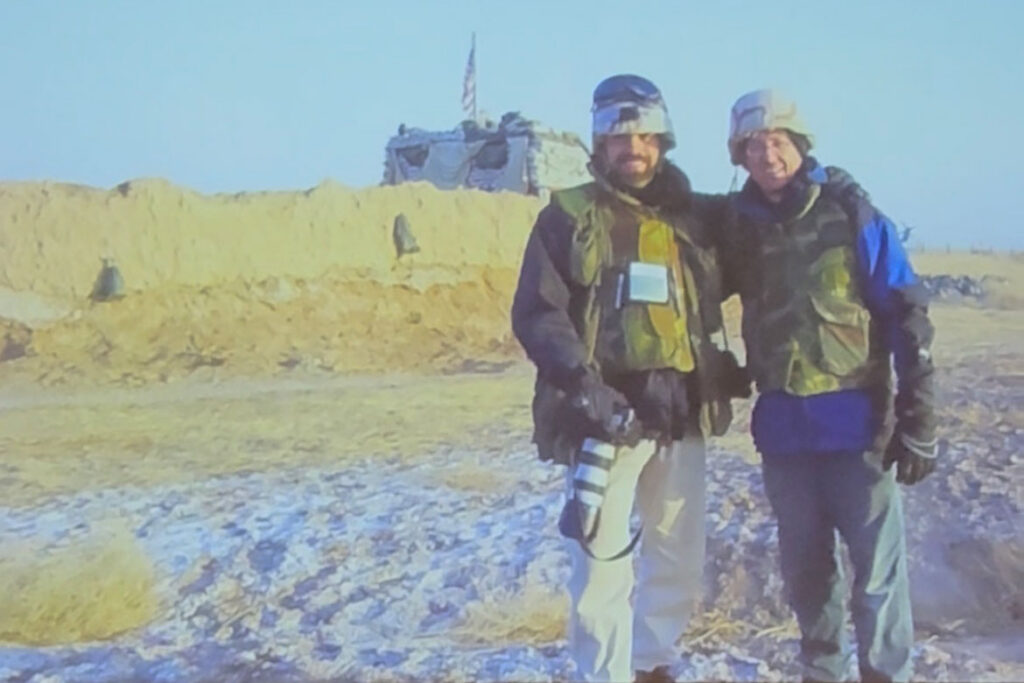 Retired Tennessean reporter and Middle Tennessee State University School of Journalism and Strategic Media professor Leon Alligood, right, and his photographer Eric Parsons pose for a photo in Afghanistan in January 2002. The two spent six weeks embedded with the 101st Airborne Division based out of Clarksville, Tenn. (Photo submitted)