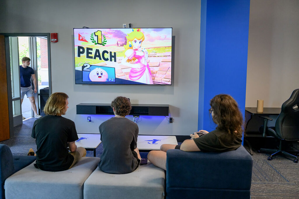 Middle Tennessee State University students are seen here playing Super Smash Bros. Ultimate in the newly expanded Esports Level Up Arena located on the first floor of the Student Union Building on the Murfreesboro, Tenn., campus. The Level Up Arena provides a casual gaming space, console gaming space and competitive game space and is open to all MTSU students. (MTSU photo by J. Intintoli)