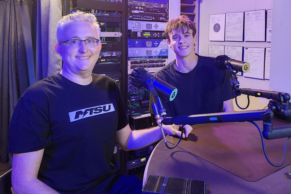Richard Lewis, left, associate professor of animation and esports coordinator at Middle Tennessee State University, and Kyle Greaney, the vice president for the MTSU Esports club, await a Sept. 21 interview in WGNS Radio’s downtown Murfreesboro, Tenn., studio. (MTSU photo by Jimmy Hart)