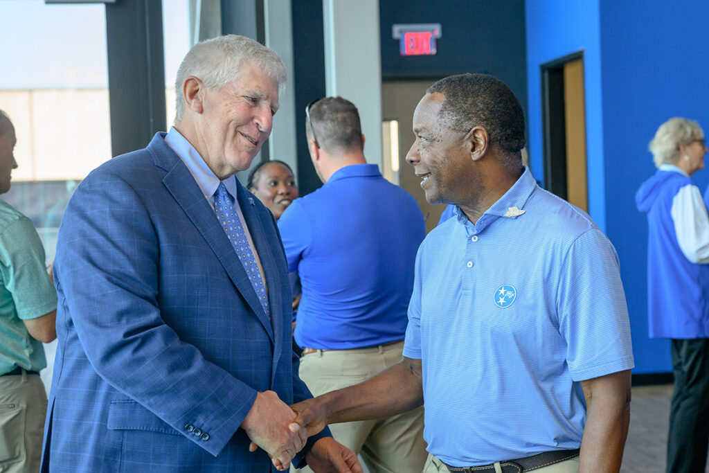 Middle Tennessee State University Director of Athletics Chris Massaro, left, shakes hands with MTSU President Sidney A. McPhee following a press conference held Thursday, Sept. 3, 2026, inside the SRM Concrete Club on the third floor of the Smith Student-Athlete Performance Center on the north end of Floyd Stadium. Massaro outlined a $16 million west seating upgrade to the stadium that will begin at season’s end and is expected to be completed by the start of the 2027 Blue Raider football season. (MTSU photo by J. Intintoli)
