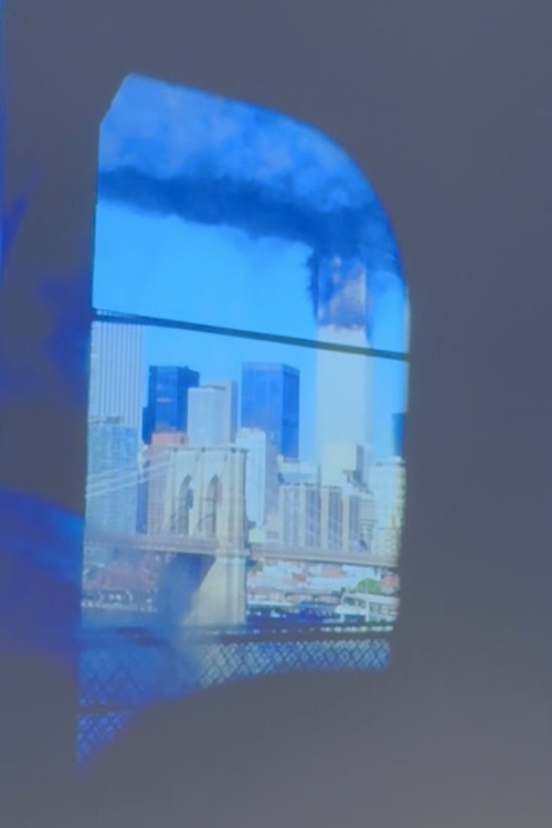 From the subway, photojournalist Joe DiPetro captured this image showing the Brooklyn Bridge and smoke coming from the Twin Towers on the morning of Sept. 11, 2001, in New York City. (Photo by Joe DiPetro)