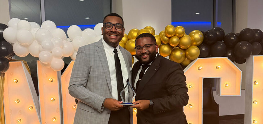 Middle Tennessee State University graduate student RJ Ware holds his “Youth of the Year” award from the Murfreesboro branch of the National Association for the Advancement of Colored People alongside alum and mentor Michai Mosby, now strategic marketing and communications specialist for Student Affairs, presented to Ware at the NAACP’s Freedom Fund Gala in the Student Union Building on the Murfreesboro, Tenn., campus on Saturday, Aug. 22, 2026. (Submitted photo)