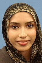 Sakina Razzaq, Buchanan Fellow, smiling wearing a hijab.