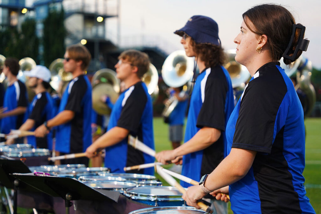 A row of Middle Tennessee State University Band of Blue drummers performs during the final evening of band camp Aug. 21, 2026, on campus in Murfreesboro, Tenn. The performance gave donors and guests a preview of the Band of Blue as students prepared for the start of the 2026 football season. (MTSU photo by Mike Davis) 