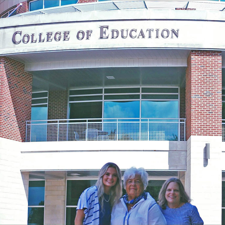 In this undated photo, Middle Tennessee State University student Meredith Powers stands outside the College of Education on the Murfreesboro, Tenn., campus with her grandmother, Sarah June Hunter Moss, and mom, Candace Moss Powers, both of whom were also education majors at MTSU. (Photo submitted)