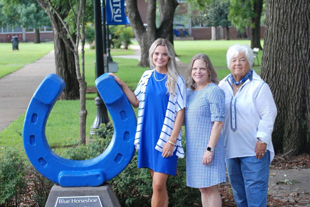 From left, Middle Tennessee State University College of Education student Meredith Powers stands at the Blue Horseshoe in Walnut Grove with her mom, Candace Moss Powers, and grandmother, Sarah June Hunter Moss, both of whom also attended the Murfreesboro, Tenn., university and were education majors. (Photo submitted)